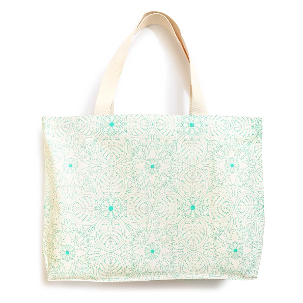 A big canvas tote for grocery shopping, trips to the laundromat, bulky art supplies, with all the space you need! With our tropical leaf print, designed and handmade in Malaysia by Bingka.KL